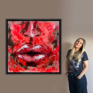 Abstraktes Leinwandbild „FURY“ mit expressivem Gesicht in leuchtenden Rot-, Schwarz- und Weißtönen – moderne Wandkunst mit markanten Lippen und intensiver Ausstrahlung.